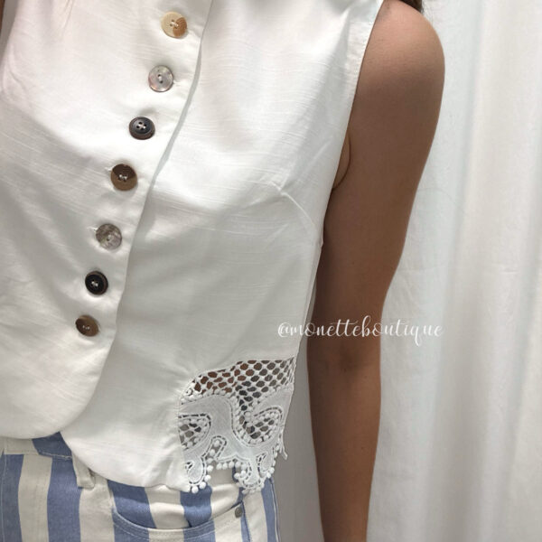 Chaleco blanco botones